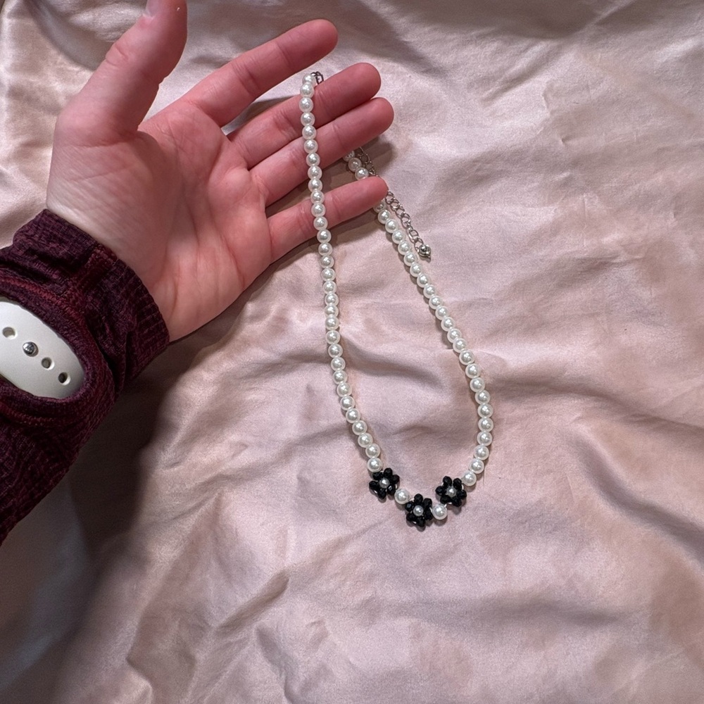 Elegant Pearl and Black Flower Necklace - Picture 2 of 5